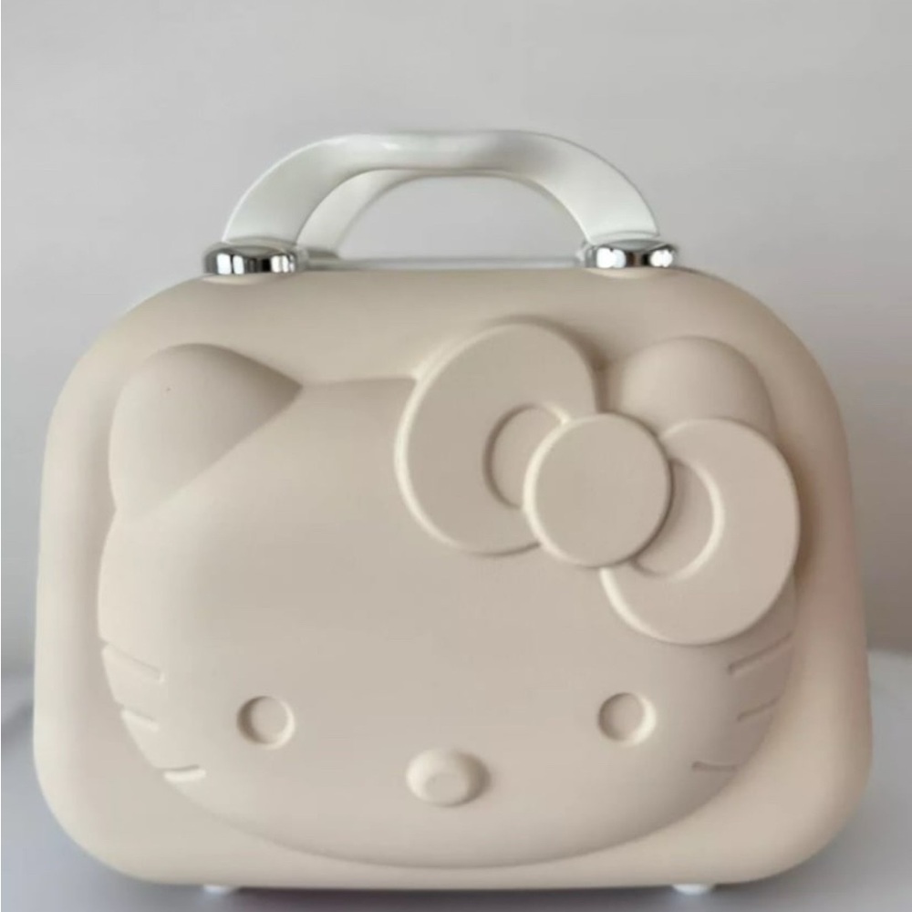 Beige Hello Kitty hard case suitcase/ cosmetic bag